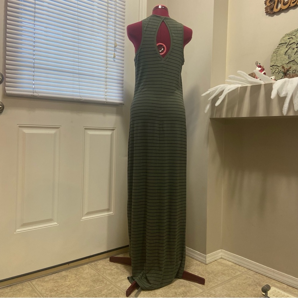Express women green and black stripes, stretch knit maxi dress. Size S. Used.